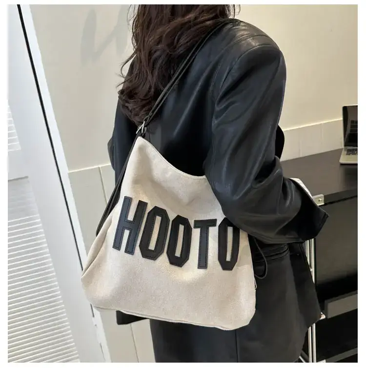Textured Canvas Shoulder Bag Black White 2023 — feature 34
