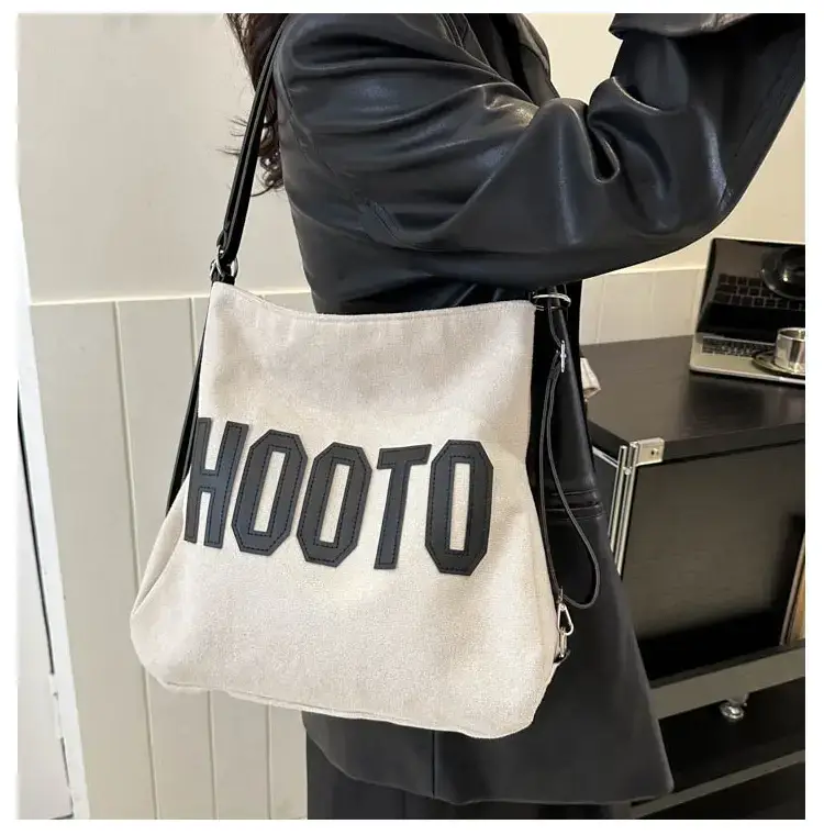 Textured Canvas Shoulder Bag Black White 2023 — feature 35