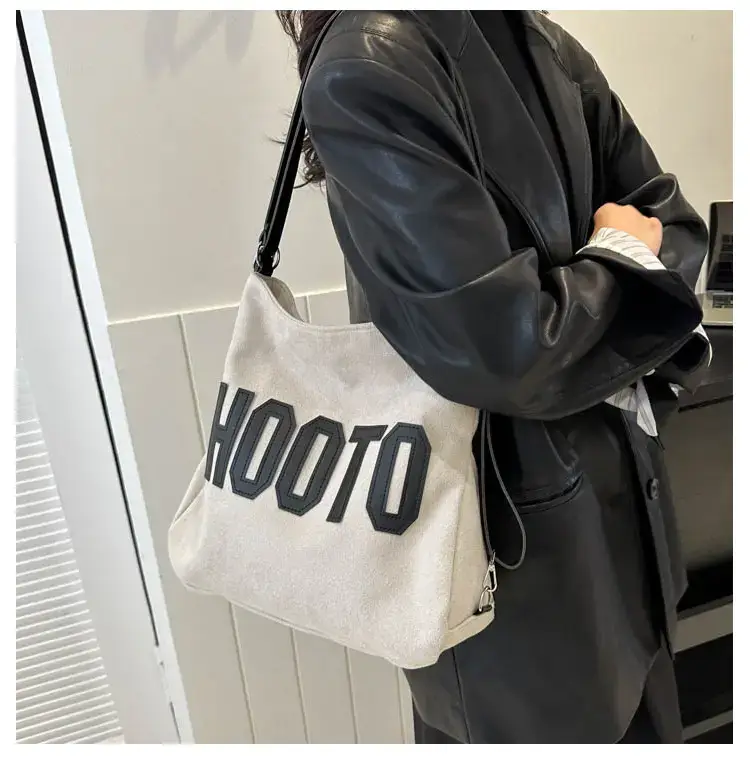 Textured Canvas Shoulder Bag Black White 2023 — feature 36