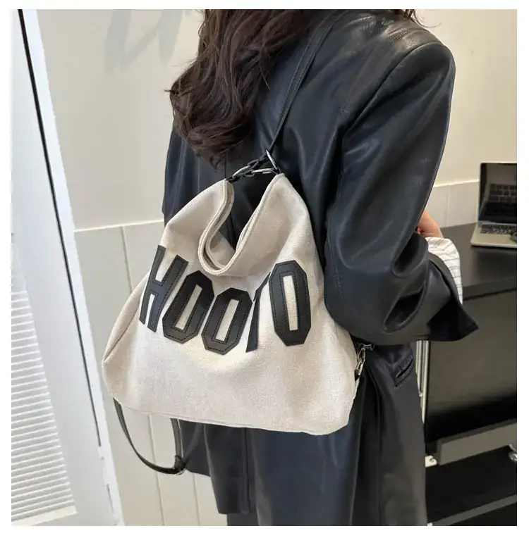 Textured Canvas Shoulder Bag Black White 2023 — feature 38