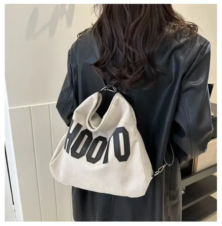 Textured Canvas Shoulder Bag Black White 2023 — feature 39