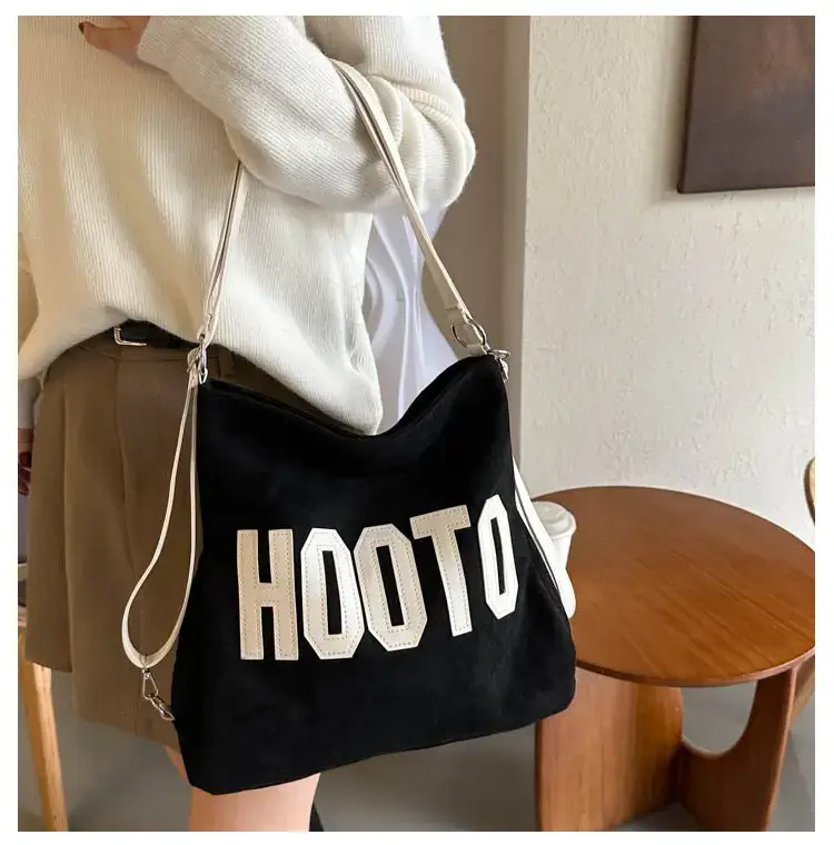 Textured Canvas Shoulder Bag Black White 2023 — feature 9