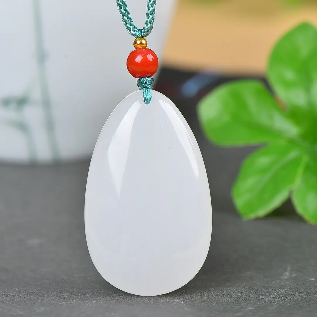 White Jade Water Drop Pendant with Red Bead - Image 3
