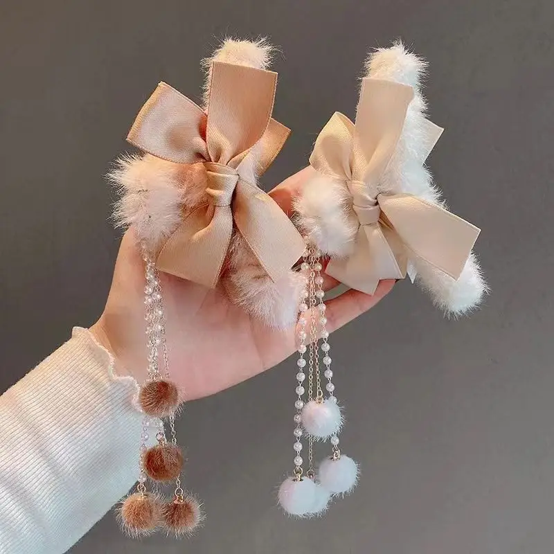 New plush flower hairpin with tassel and bear design — feature 1