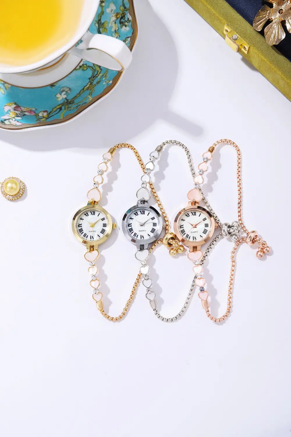 Women's Rose Gold Roman Numeral Bracelet Watch — feature 1