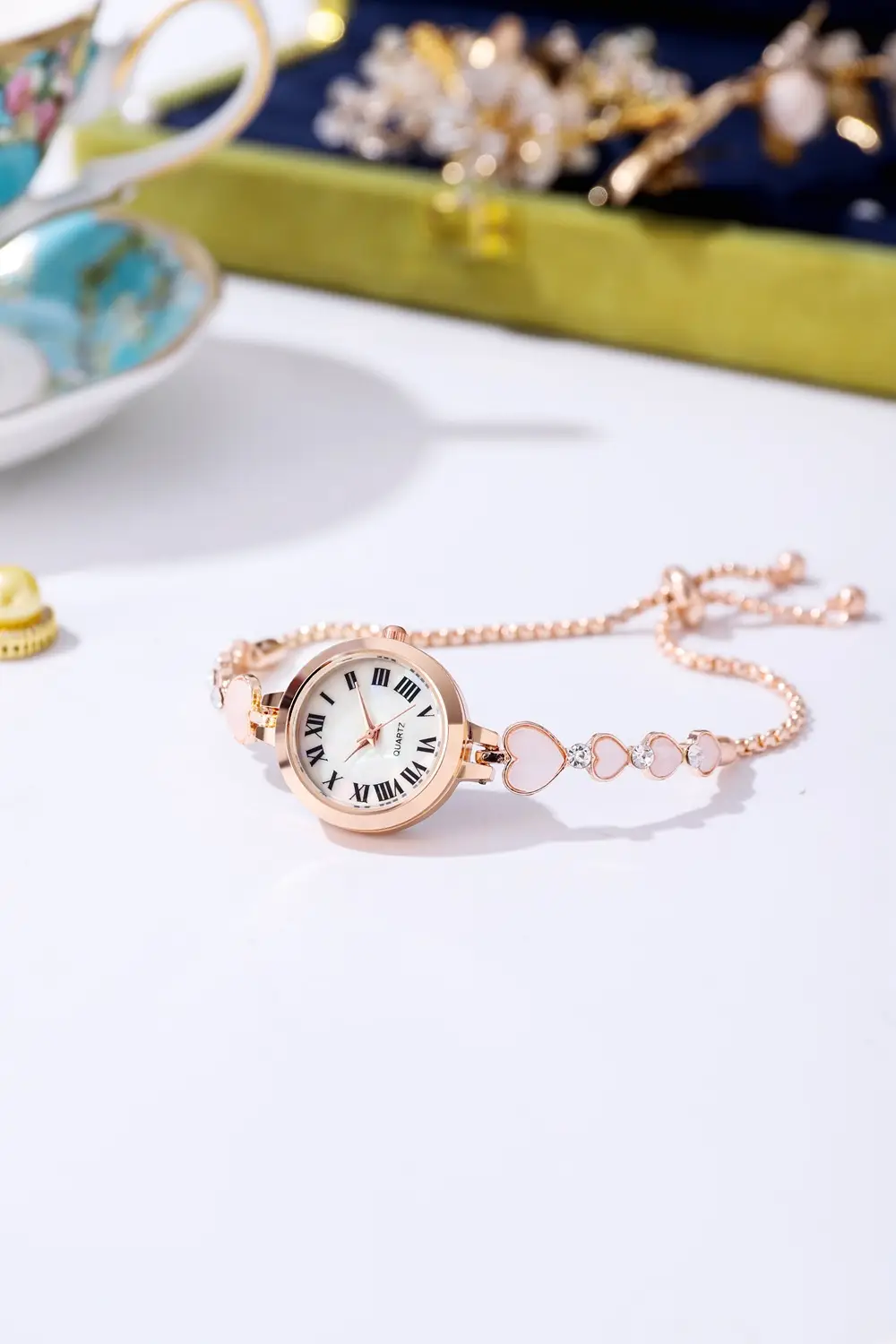 Women's Rose Gold Roman Numeral Bracelet Watch — feature 2