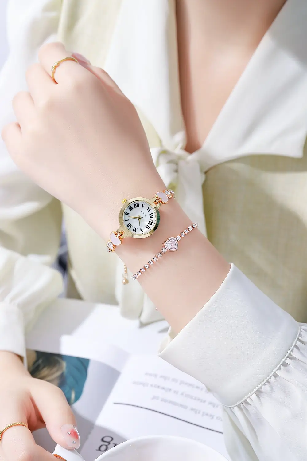 Women's Rose Gold Roman Numeral Bracelet Watch — feature 5