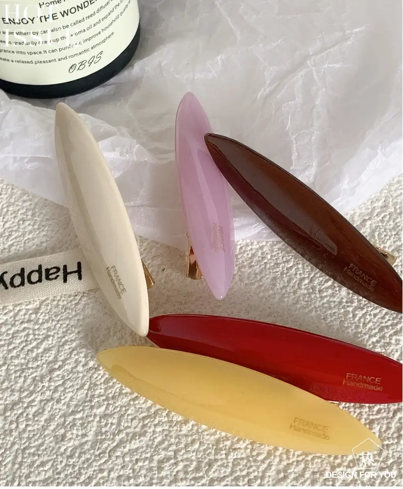 Red French Retro Hair Clip with Gold Label — feature 3