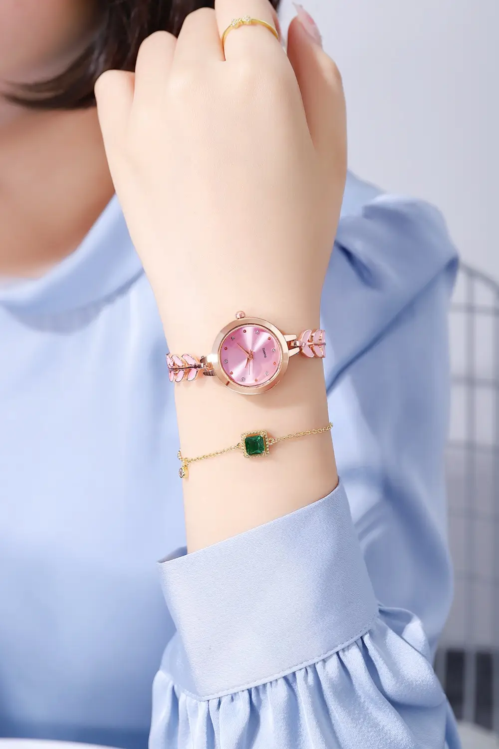Women's Blue Dial Bracelet Watch with Green Gemstone — feature 10