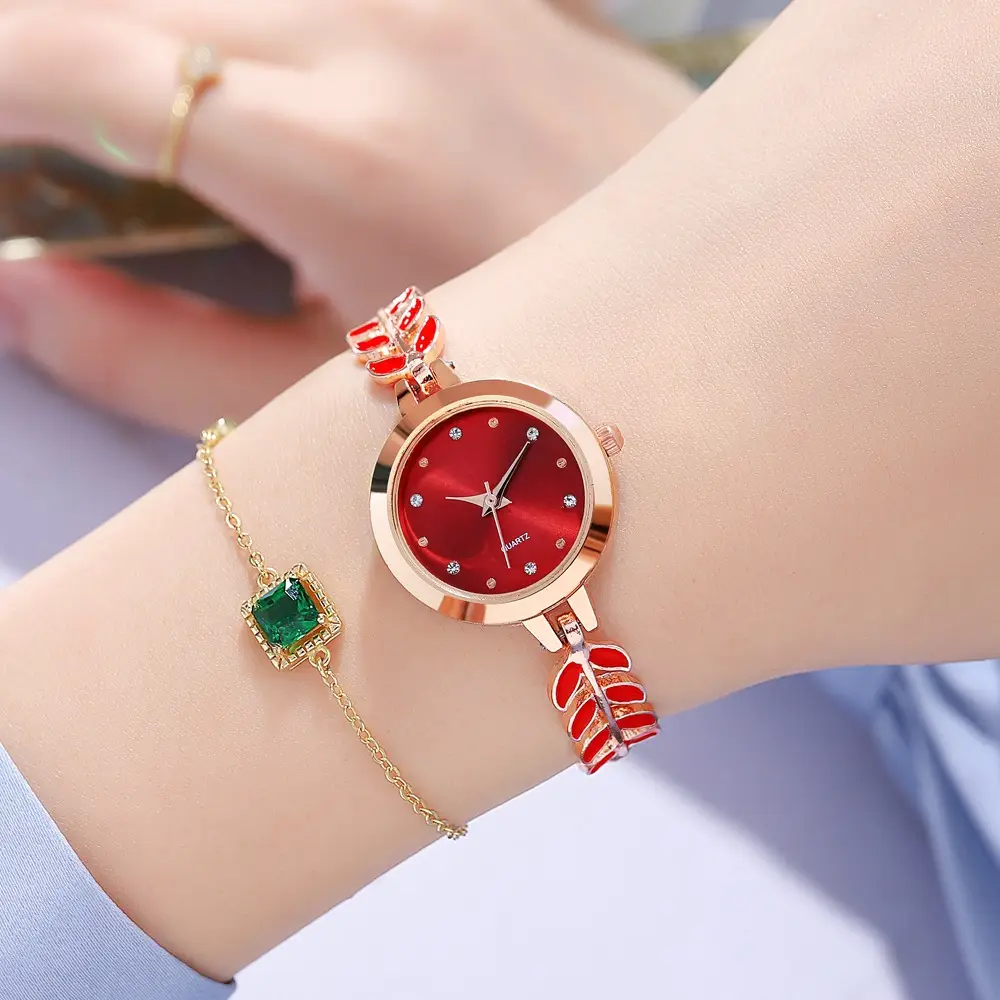 Women's Blue Dial Bracelet Watch with Green Gemstone — feature 15
