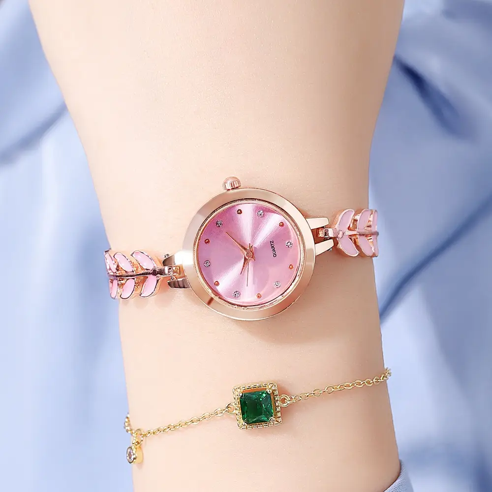 Women's Blue Dial Bracelet Watch with Green Gemstone — feature 18