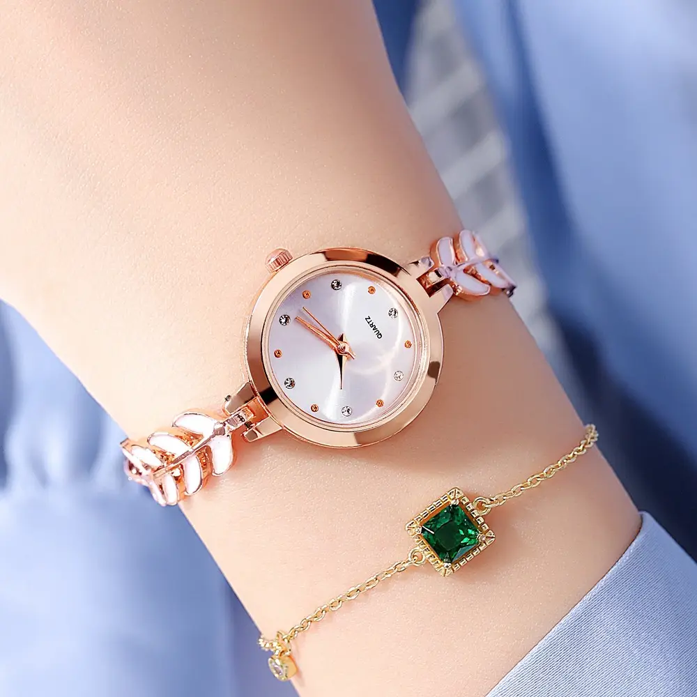 Women's Blue Dial Bracelet Watch with Green Gemstone — feature 19