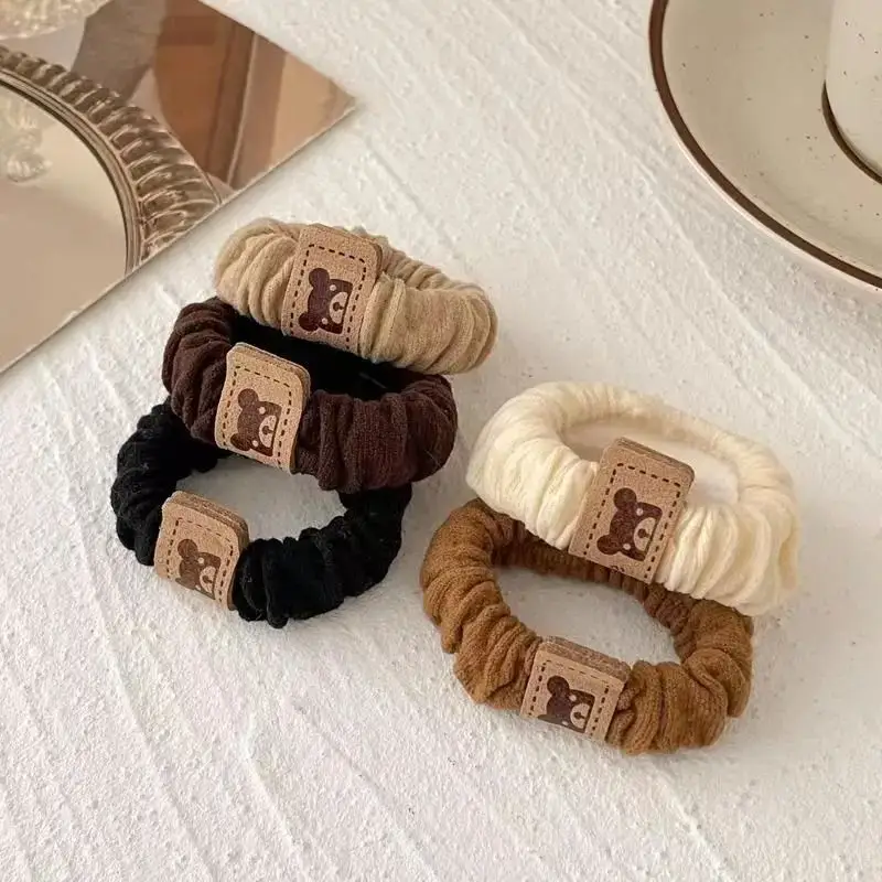 6-Piece Brown Bear Logo Hair Bands for Women - Image 43