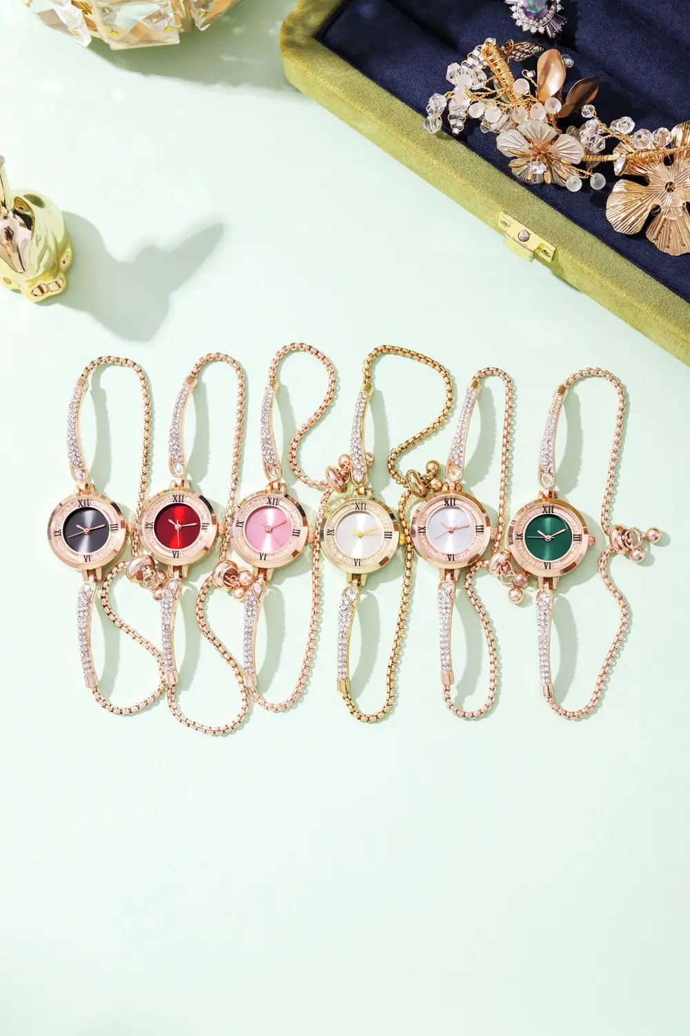 Rose Gold Cross Bracelet Watch with Crystal Accents — feature 1