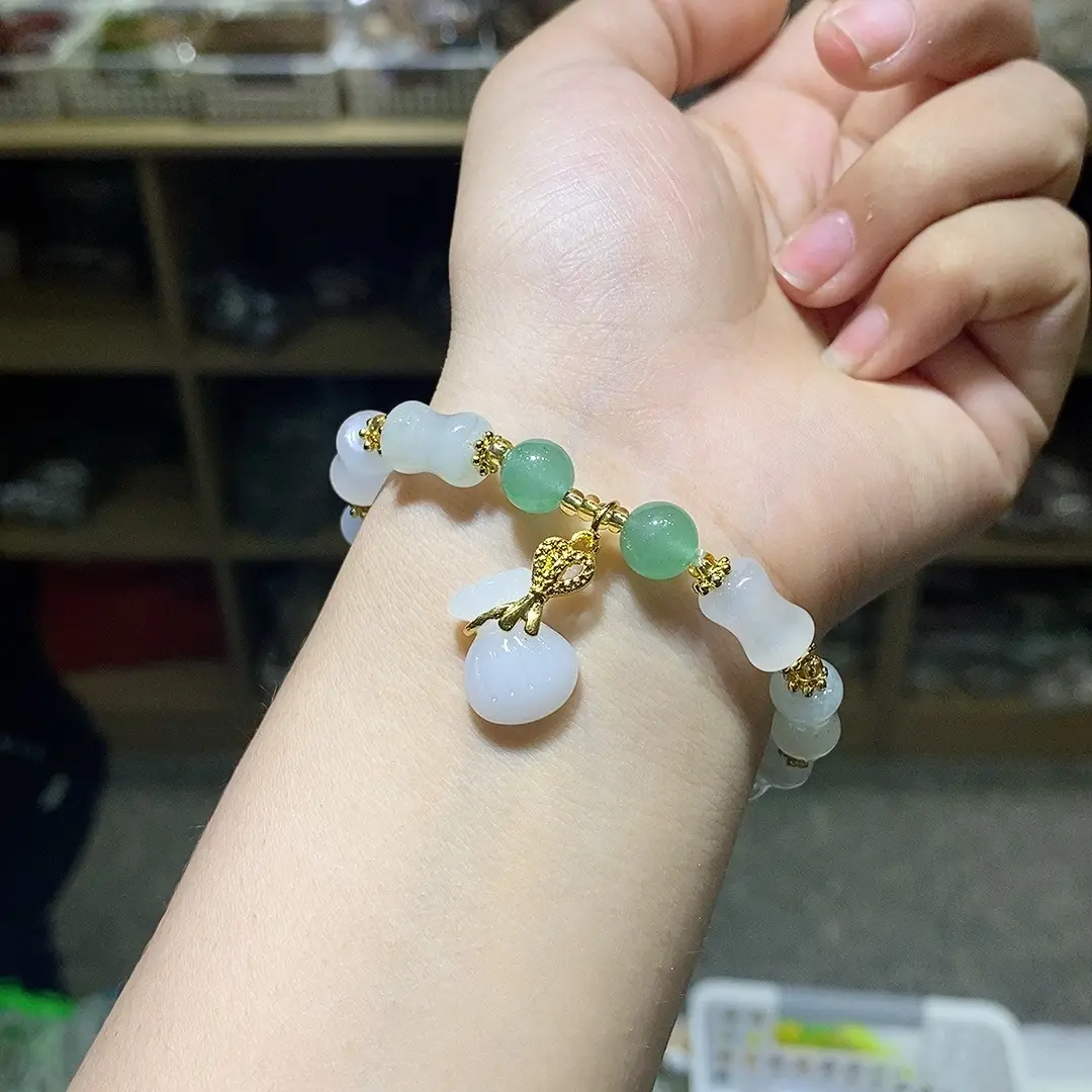 Tian San Green Bamboo Handstring Bracelet with Pearl Drop - Image 4