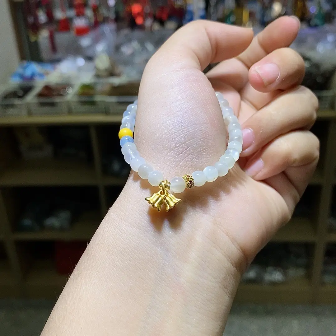 White Moonstone Bracelet with Yellow Beads and Gold Charm - Image 3