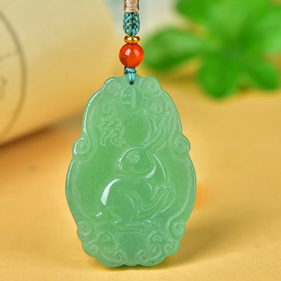 Green Jade Pendant with Red Bead and Embroidered Design - Image 3