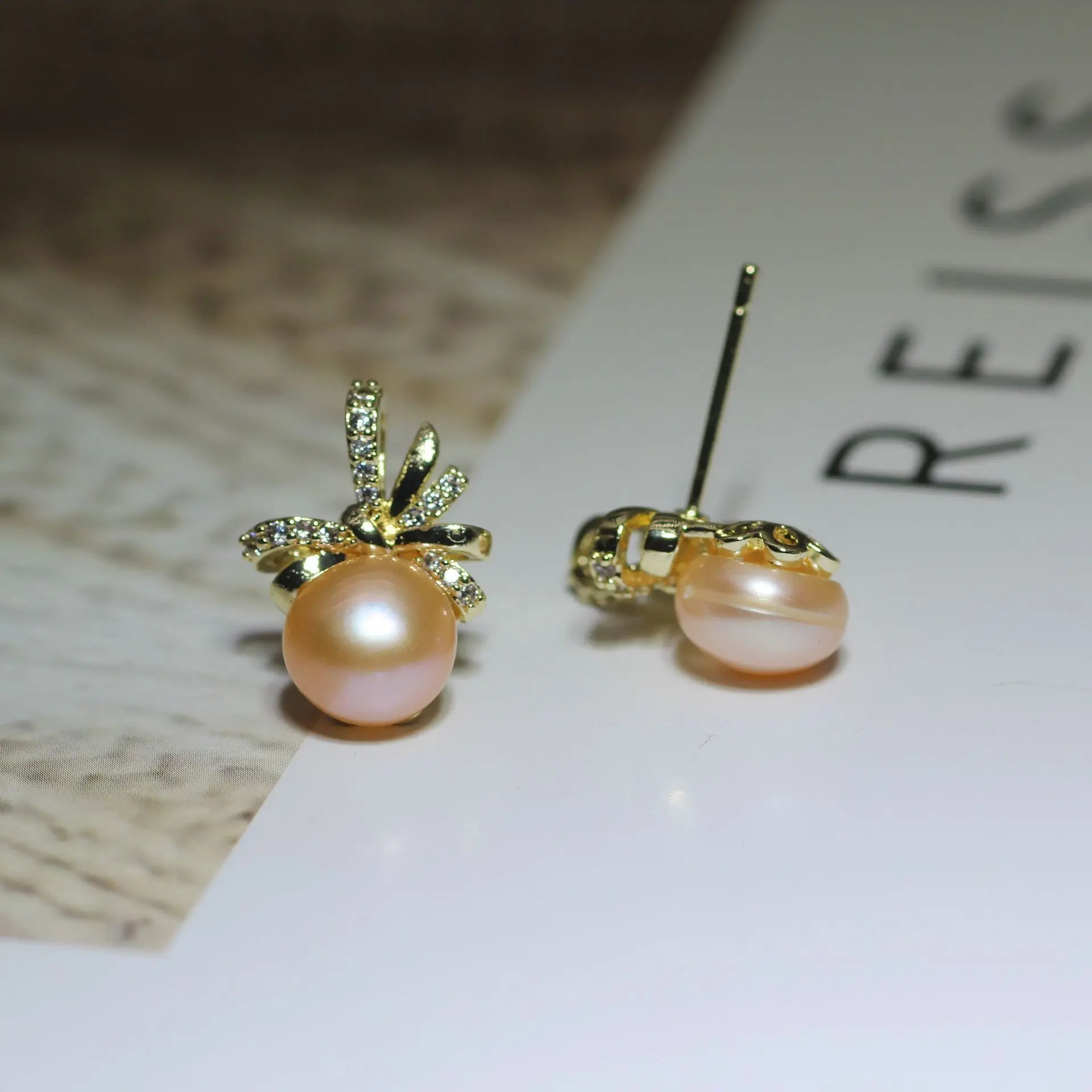 Women's Bow Pearl Earrings Copper Plated Real Gold — feature 10