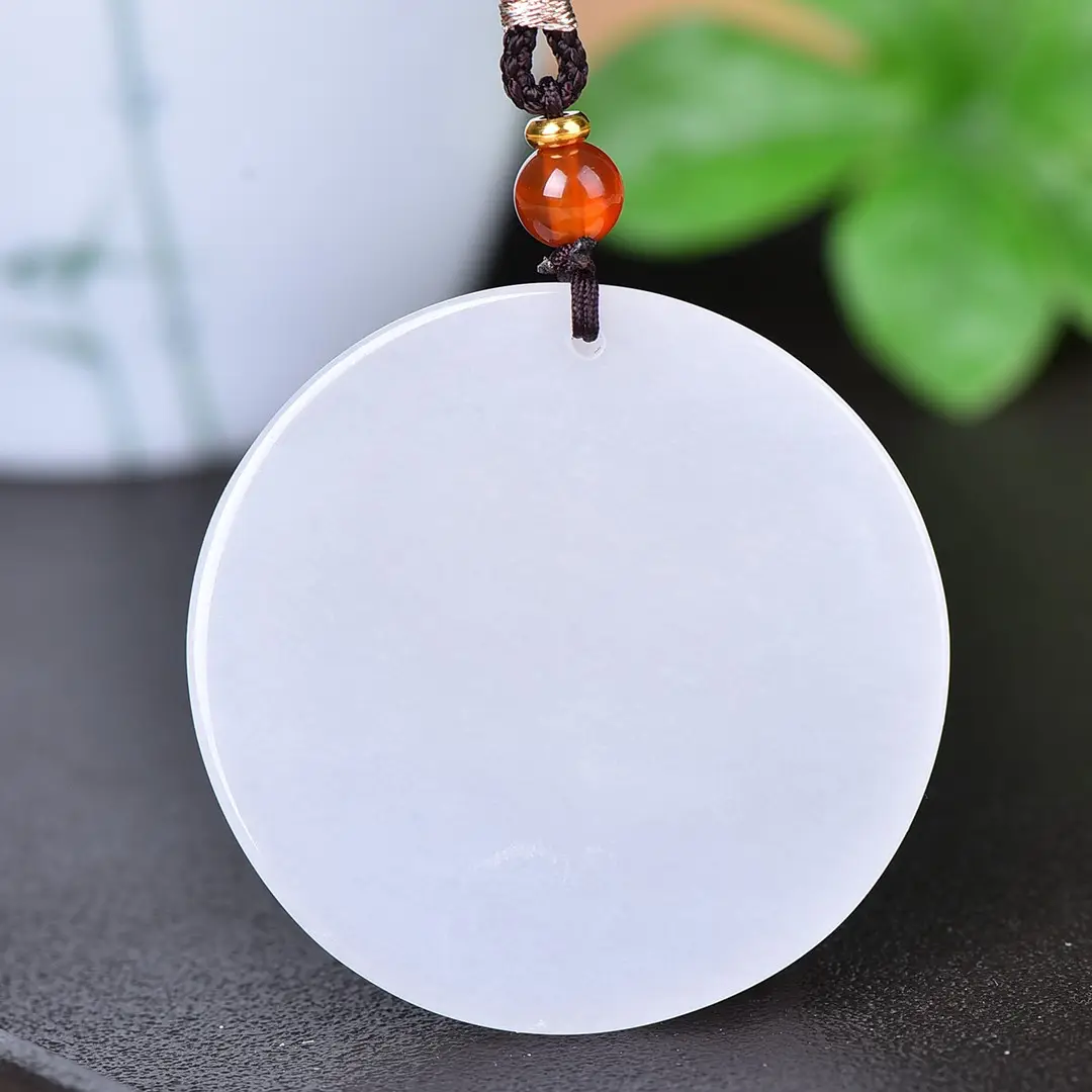 White Jade Dragon Pendant with Red Bead — feature 7