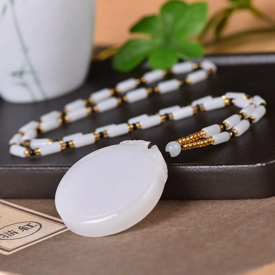 White Round Jade Peace Pendant with Gold Chain - Image 4