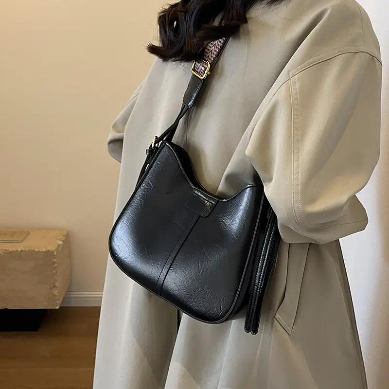 Women's Brown Leather Crossbody Bag with Patterned Strap - Image 8