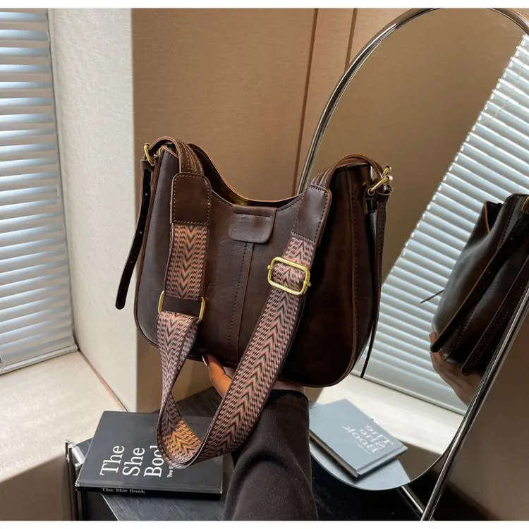 Women's Brown Leather Crossbody Bag with Patterned Strap — feature 34