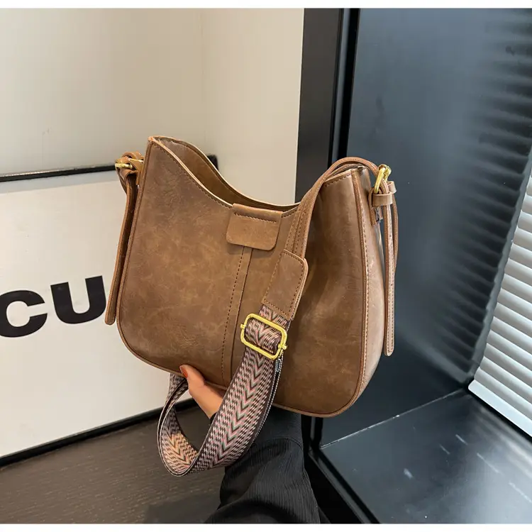 Women's Brown Leather Crossbody Bag with Patterned Strap — feature 39