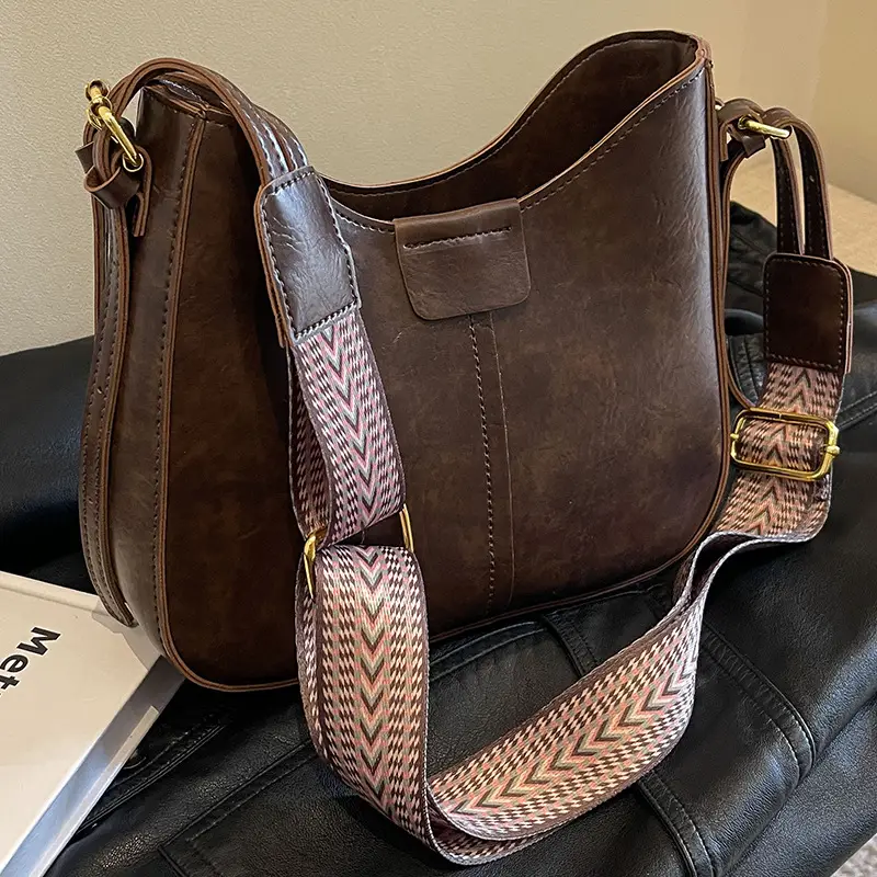 Women's Brown Leather Crossbody Bag with Patterned Strap - Image 2