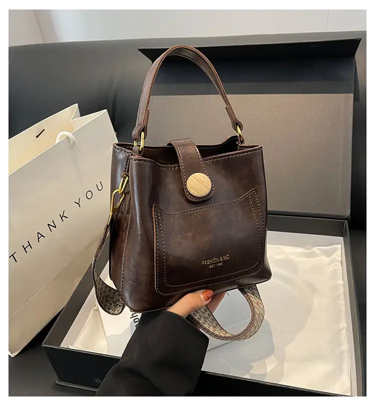 Women's Brown Leather Shoulder Bag with Gold Plated Handle — feature 10