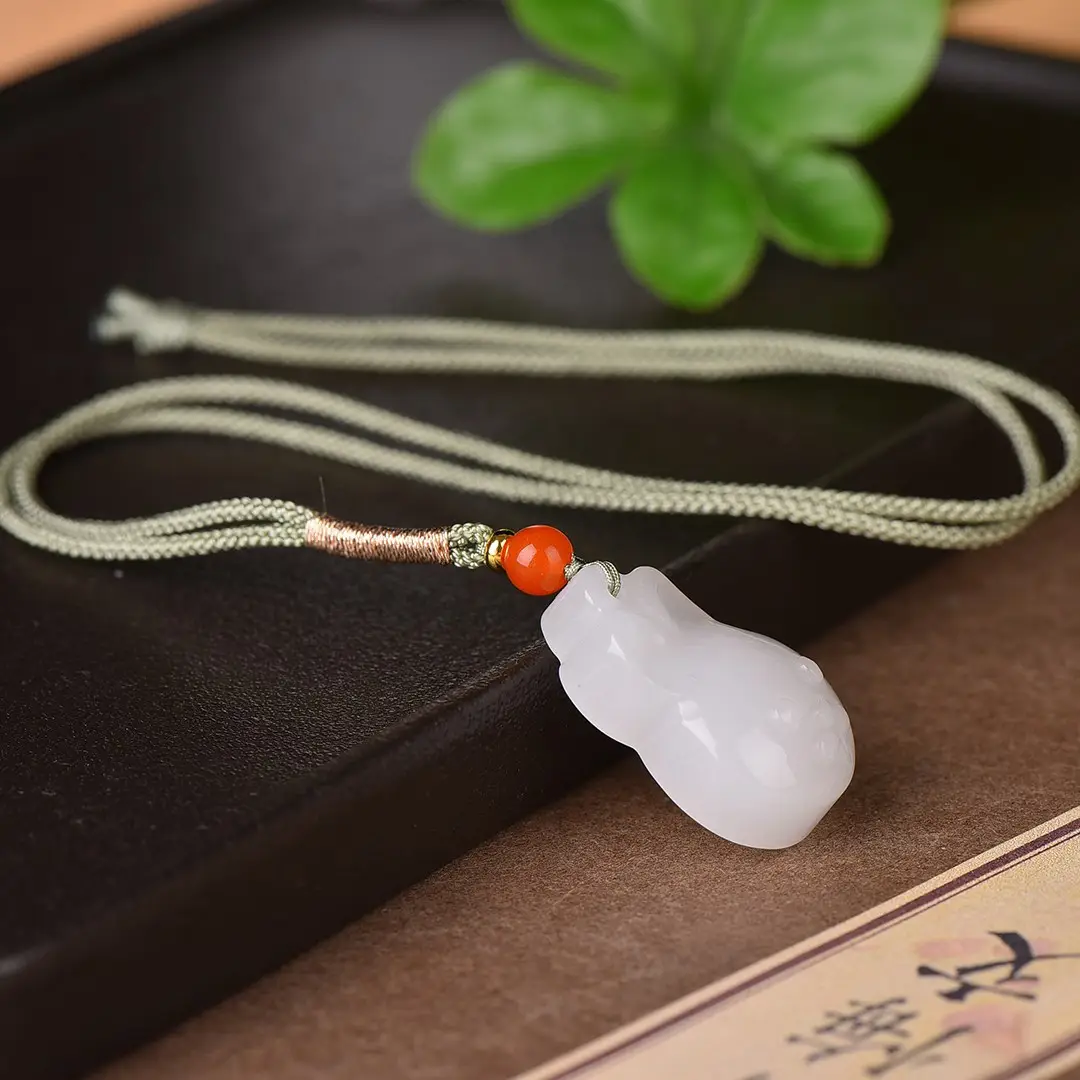 White Jade Bear Pendant with Red Stone - Image 4