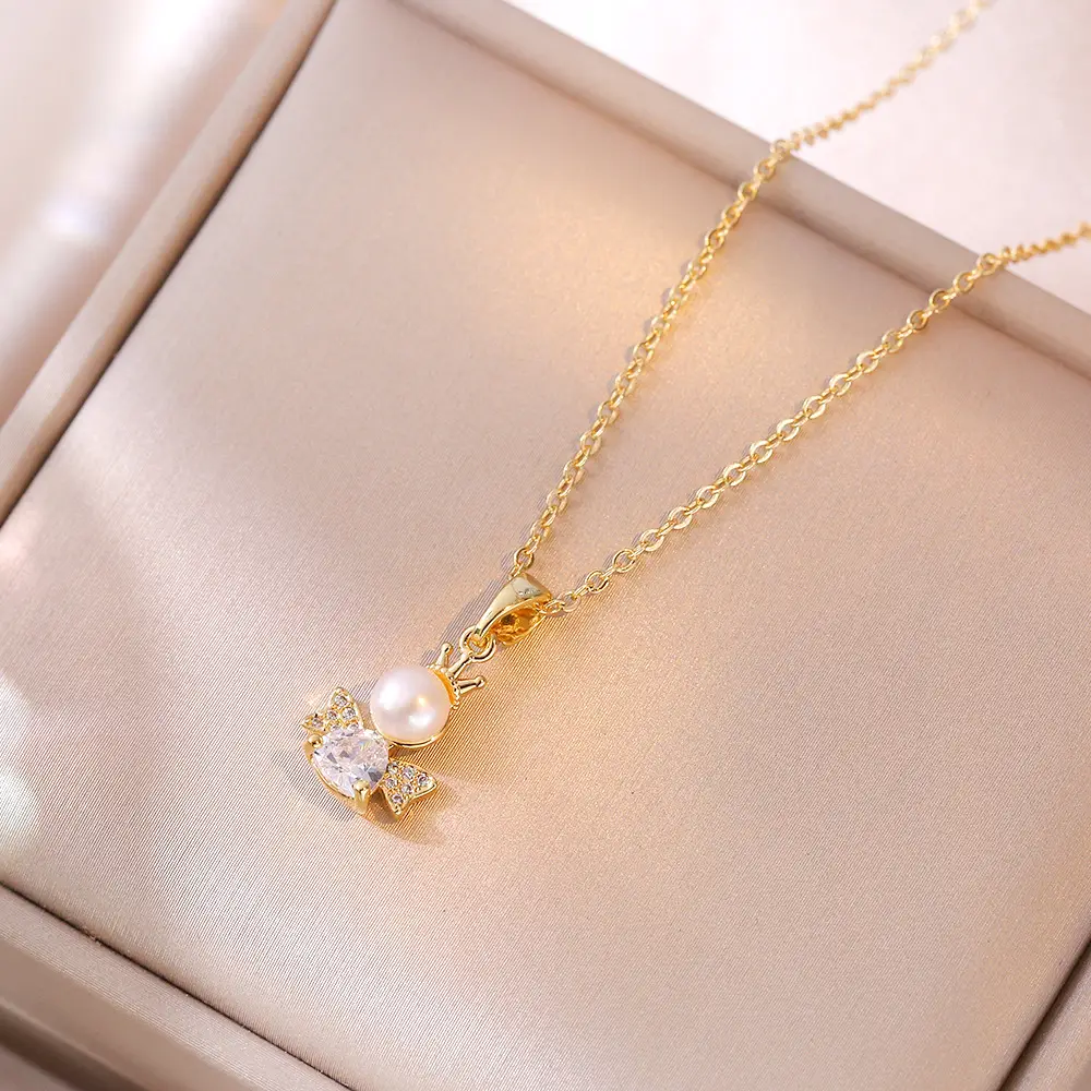 Gold Pearl Necklace with Little Angel Design - Image 4