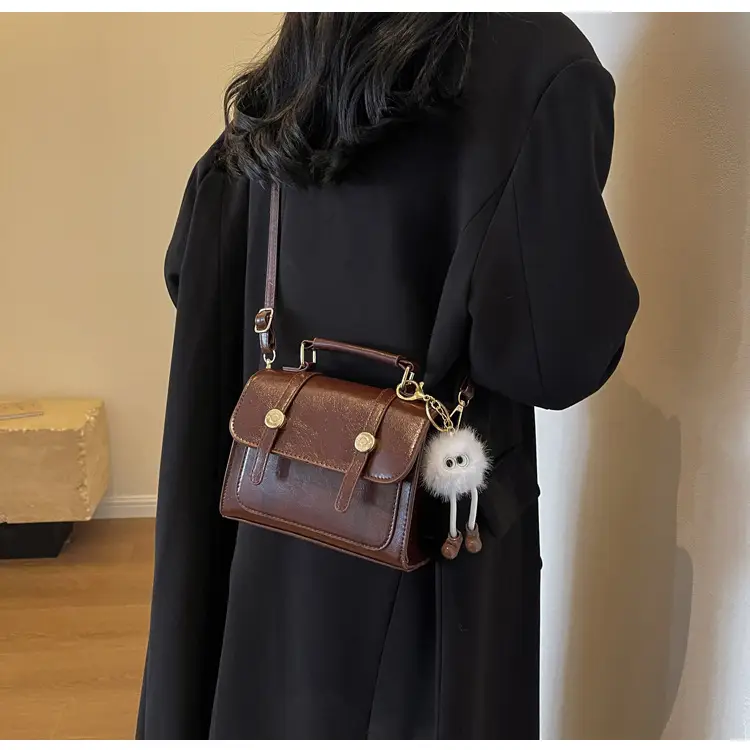Women's Black Leather Shoulder Bag with Gold Plated Handles — feature 12