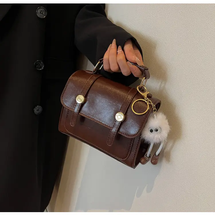 Women's Black Leather Shoulder Bag with Gold Plated Handles — feature 13
