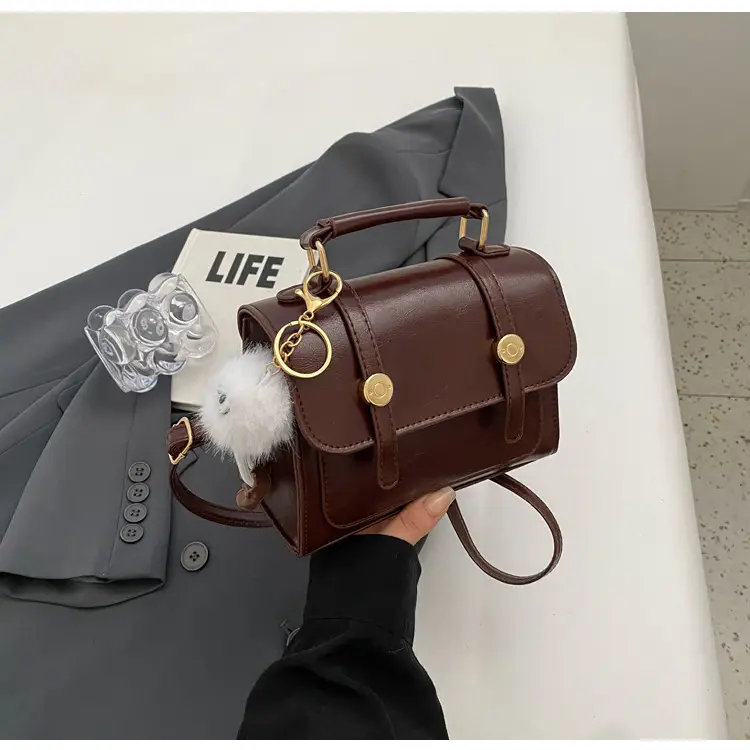 Women's Black Leather Shoulder Bag with Gold Plated Handles — feature 23