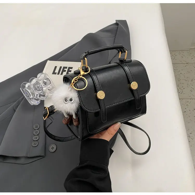 Women's Black Leather Shoulder Bag with Gold Plated Handles — feature 24