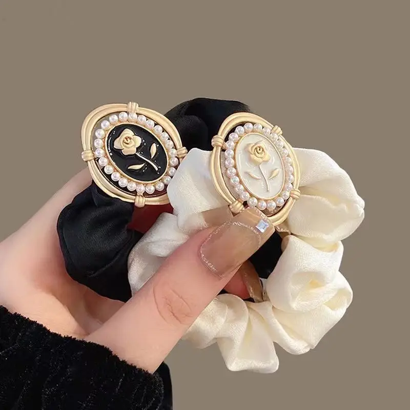 Brown Satin Hair Scrunchie with Gold Logo Watch — feature 2