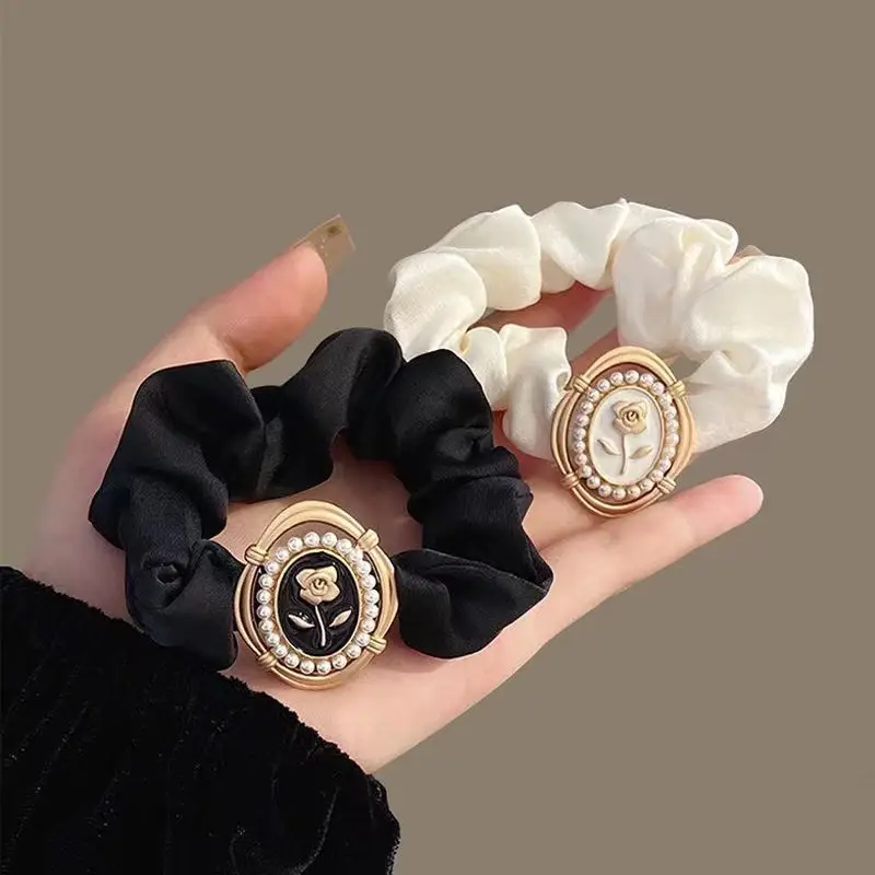 Brown Satin Hair Scrunchie with Gold Logo Watch — feature 7
