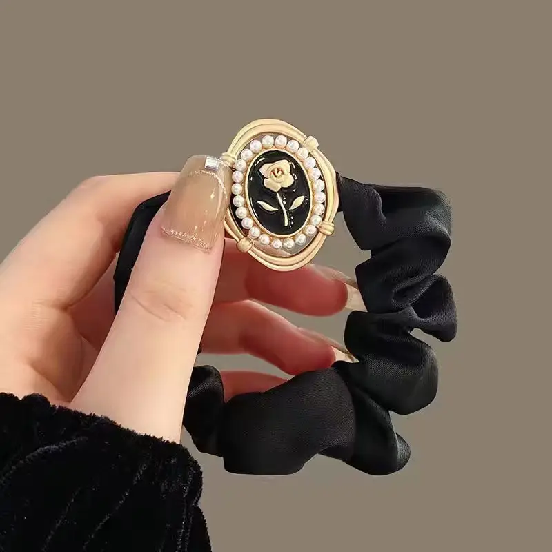 Brown Satin Hair Scrunchie with Gold Logo Watch — feature 5