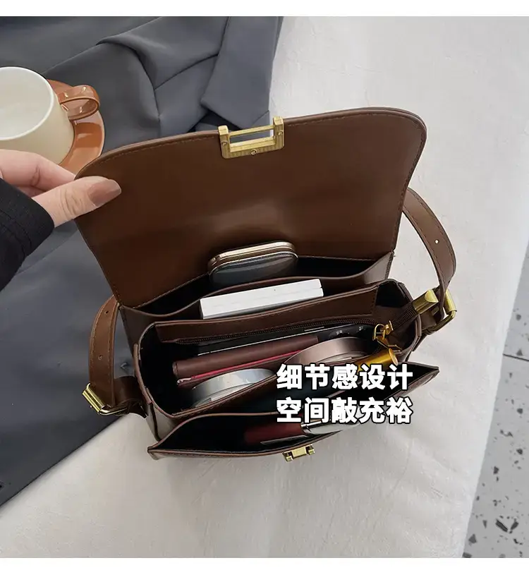Black Leather Shoulder Bag with Gold Clasp 2023 — feature 10