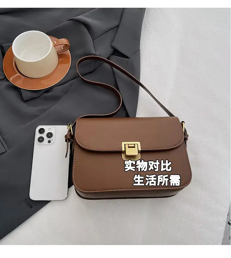 Black Leather Shoulder Bag with Gold Clasp 2023 — feature 11