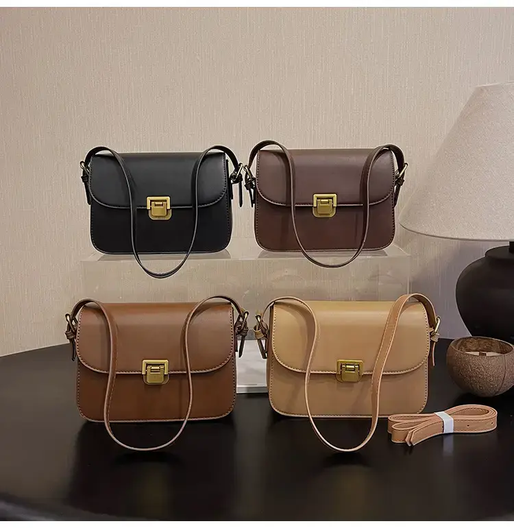 Black Leather Shoulder Bag with Gold Clasp 2023 — feature 17