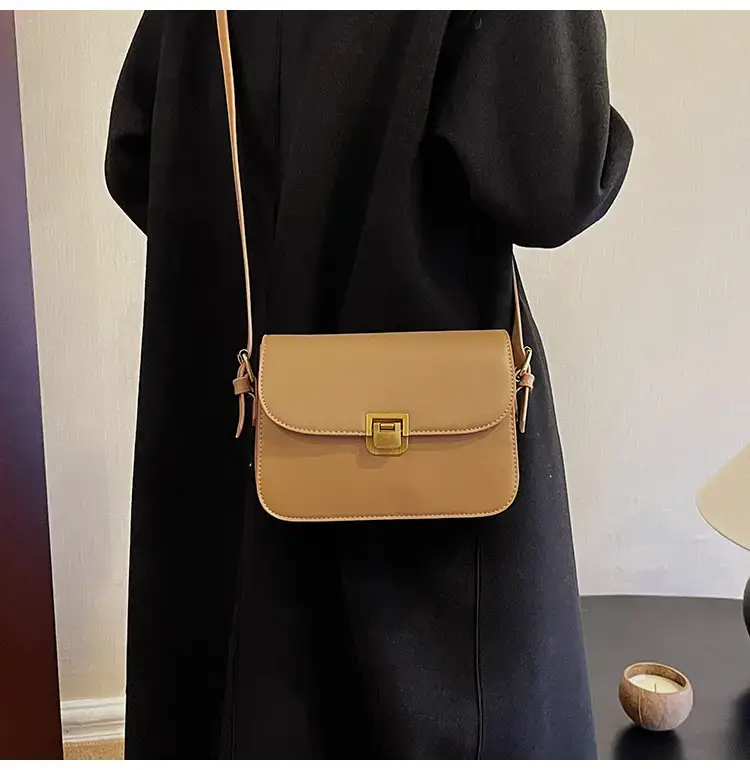 Black Leather Shoulder Bag with Gold Clasp 2023 — feature 23