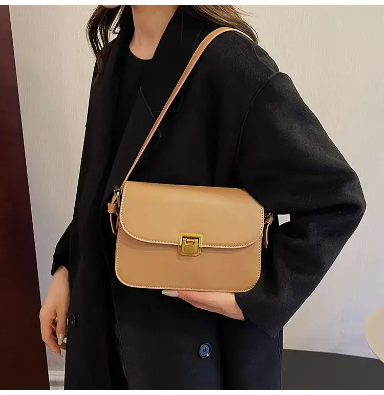 Black Leather Shoulder Bag with Gold Clasp 2023 — feature 25