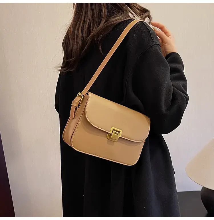Black Leather Shoulder Bag with Gold Clasp 2023 — feature 26