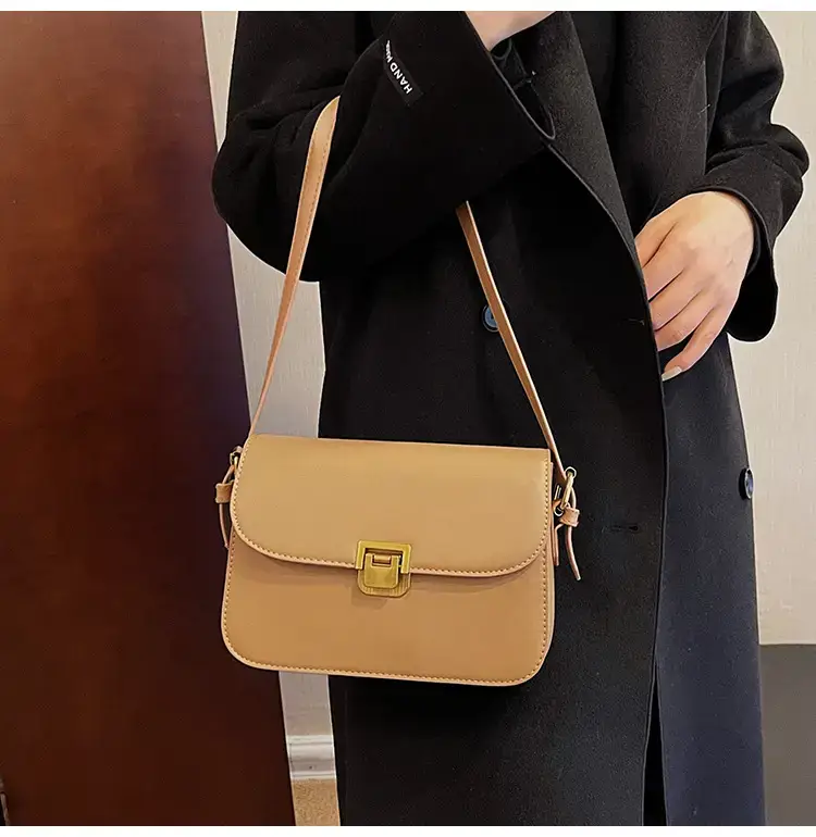 Black Leather Shoulder Bag with Gold Clasp 2023 — feature 27