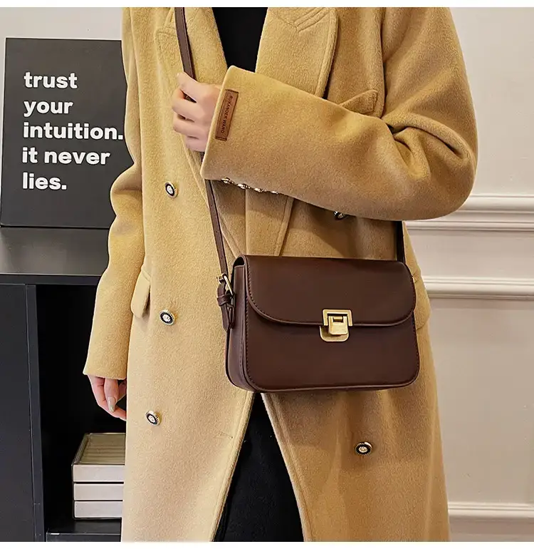 Black Leather Shoulder Bag with Gold Clasp 2023 — feature 28