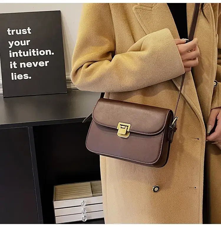 Black Leather Shoulder Bag with Gold Clasp 2023 — feature 29