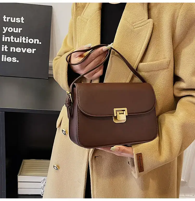 Black Leather Shoulder Bag with Gold Clasp 2023 — feature 30