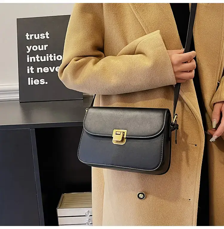 Black Leather Shoulder Bag with Gold Clasp 2023 — feature 33