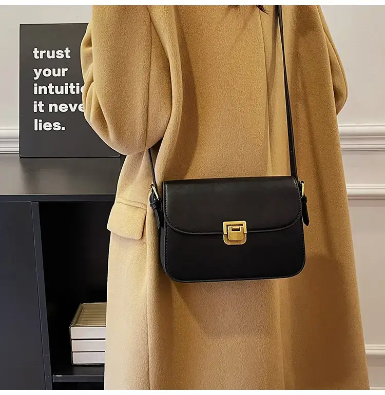 Black Leather Shoulder Bag with Gold Clasp 2023 — feature 34